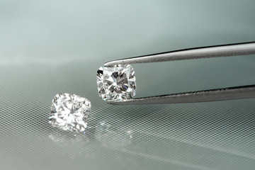 Cushion diamonds with tweezer