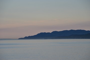 seascape with rocks on the horizon