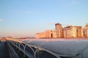 city highway in the winter at sunset