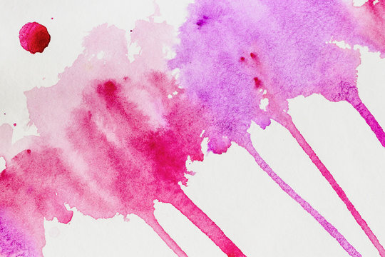 Current watercolor hand drawn. Abstract watercolor stains, texture in colorful shades of bright pink and violet colors on white paper © svetlanais