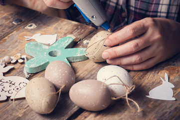 Easter egg and hot glue gun