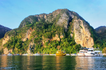 Fototapeta premium Ao Loh Dalum Bay surrounded by limestone formations on Phi Phi Don Island, Krabi Province, Thailand.
