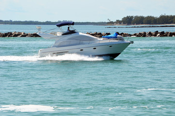 Upscale cabin cruiser on Government Cut headed to the Port of Miami