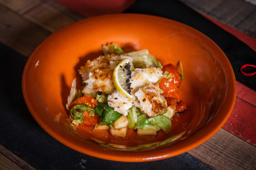 Fried fish, teriyaki sauce, vegetable salad