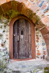 Fototapeta na wymiar Kasselburg Castle tower house door in Pelm, Rhineland-Palatinate, Germany, architectural detail