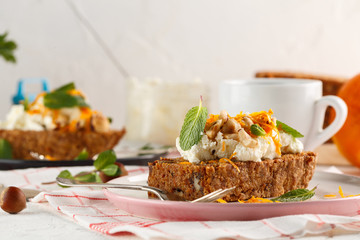 carrot fruit cake with nuts and cream