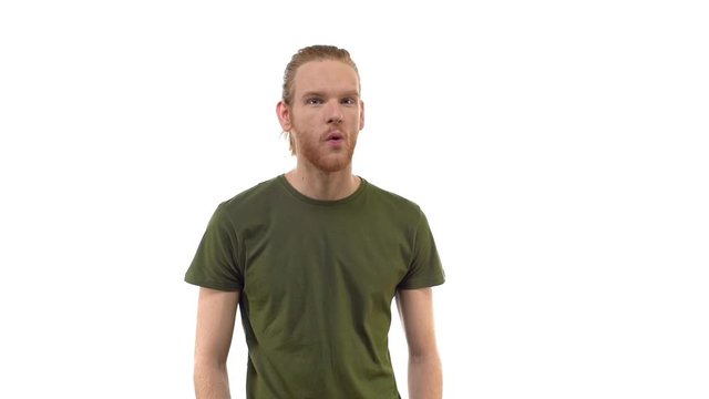 Guy rejects offer. Slowmo good-looking bearded ginger hipster guy express strong dissent shaking head disapproval refusal, answering no, unwilling participate, standing reluctant white background