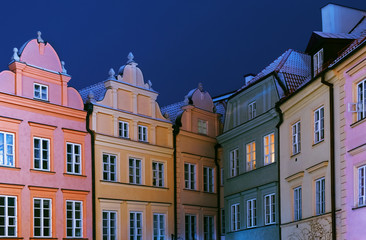 Fototapeta na wymiar Colorful tenements in the old city of Warsaw at night
