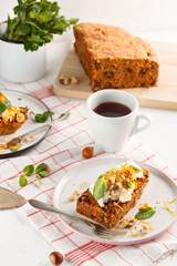 carrot fruit cake with nuts and cream