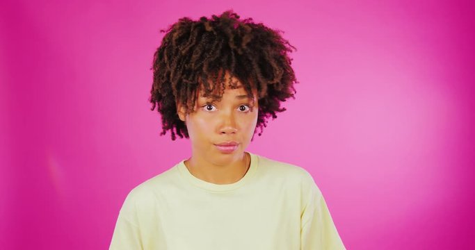 Portrait Of Displeased african girl Screaming In Shock Or Outrage, Isolated.