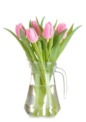 Beautiful bouquet of flowers of pink tulips in a vase on a white isolated background. spring holidays.