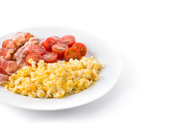 Breakfast with scrambled eggs, bacon and tomatoes isolated on white background. Copyspace