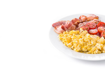 Breakfast with scrambled eggs, bacon and tomatoes isolated on white background. Copyspace