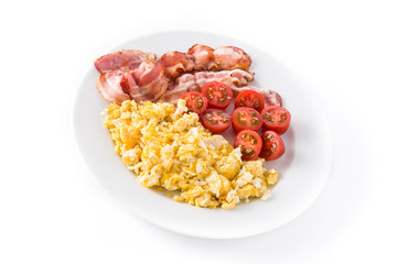 Breakfast with scrambled eggs, bacon and tomatoes isolated on white background