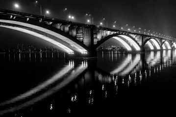 illuminated bridge on the river
