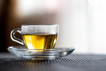 Transparent cup with tea. Cup of tea.