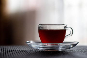 Transparent cup of coffee. A cup of coffee.