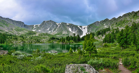 One from seven mountain Karakol lakes, located in Altai Mountains, Russia