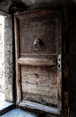 Open vintage wooden door.