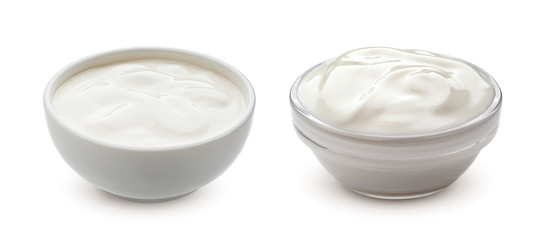 Greek yogurt in bowl isolated on white background