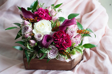 Calla, carnation, Tulip, rose Bush, rose, Ruscus, Pittosporum