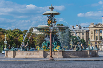 One of two Fountains on the Place de la Concorde in Paris on sunny summer day