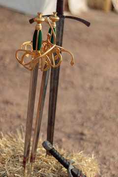 Medieval swords in a military camp