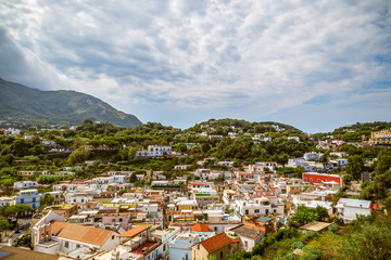 Fototapeta na wymiar Panoramic view on picturesque port and village of Lacco Ameno, Ischia island