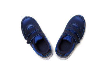Pair of sports shoes, blue sneakers isolated on white background. Top view.