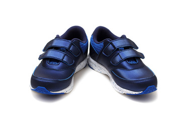 Pair of sports shoes, blue sneakers isolated on white background. Top view.