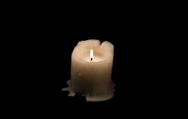 Candle on black background. Horizontal image