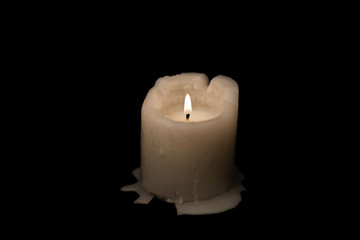 Candle on black background. Horizontal image