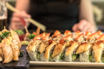 Photo of sushi rolls - japanese food in restaurant - close-up image