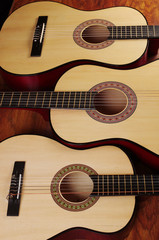 Obraz na płótnie Canvas Three acoustic guitars.