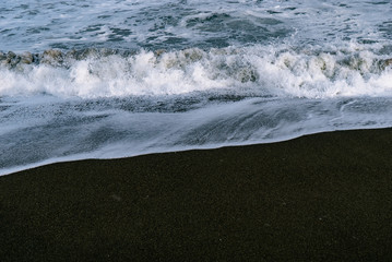 waves breaking on beach