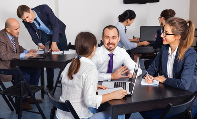 Coworkers working effectively on business project together