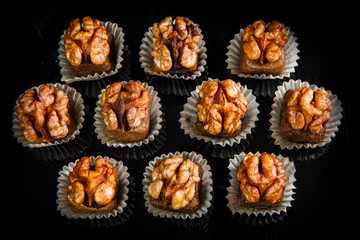 top view on group of useful handmade candies with walnut