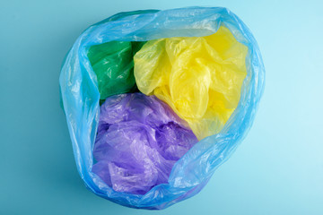 Plastic Bags isolated on blue background. Flat lay