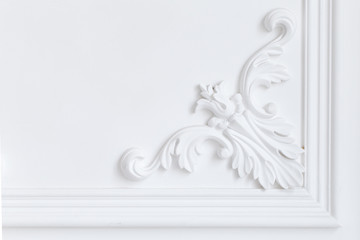Beautiful ornate white decorative plaster moldings in studio