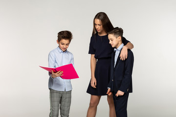 Group of children have fun while doing together homework
