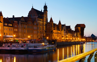 Naklejka na ściany i meble Image of night light of Moltawa River in Gdansk