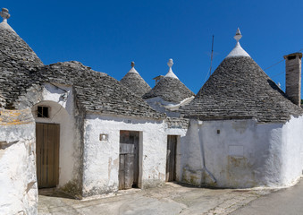 Fototapeta na wymiar The little houses trulli in Alberobello, Puglia, Italy