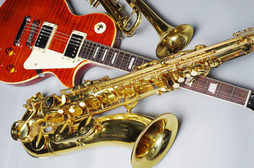 Saxophone, guitar, trumpet