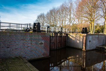 Sluice water barrrier in the river called the Vecht in the Netherlands, province Overijssel