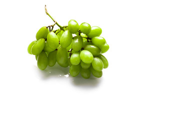 Fresh green grapes isolated on white background
