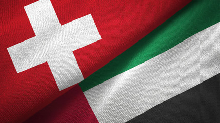 Switzerland and United Arab Emirates two flags textile cloth, fabric texture