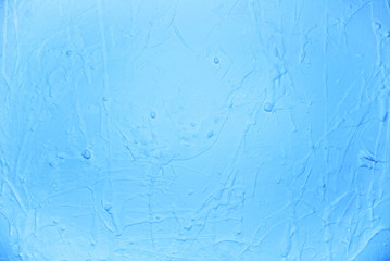 Soft paint drops on wall,  bright blue colors palette