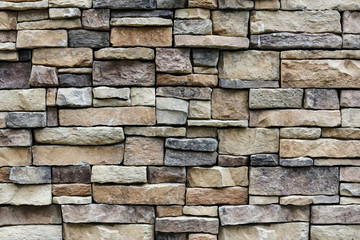 the stone wall texture background natural color.Background of stone wall texture photo.Natural...