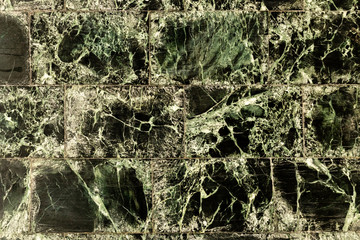 Facing wall tiles green marble, texture
