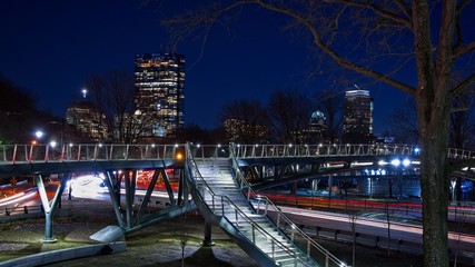 Long exposure of the Boston skyline with views of Hancock building, Prudential center, and Storrow drive